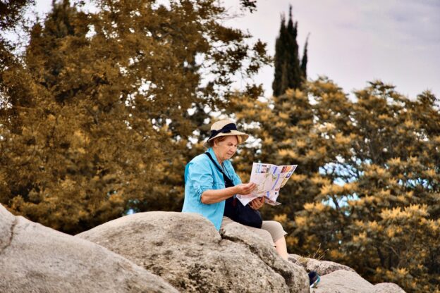 map, reading, woman