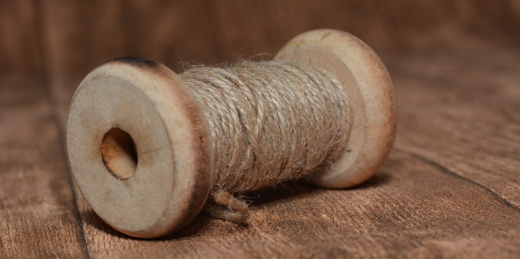coil, wooden spool, yarn