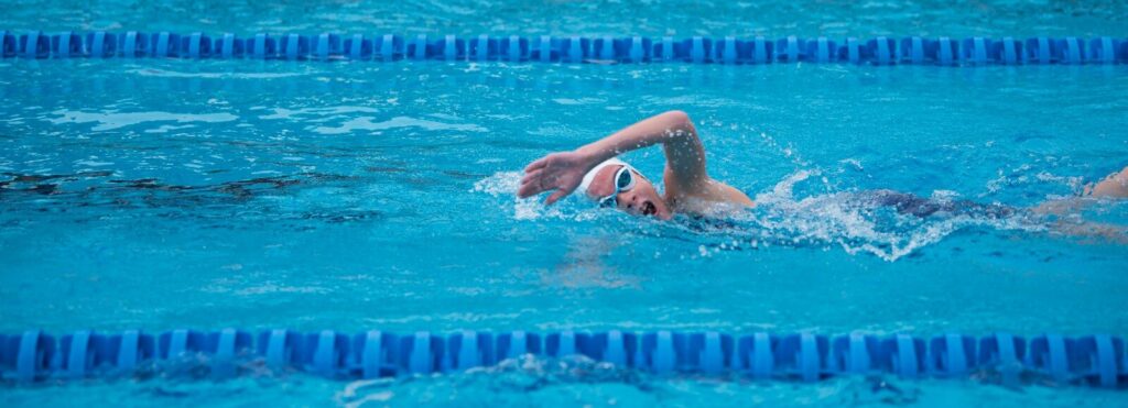woman swimming on pool